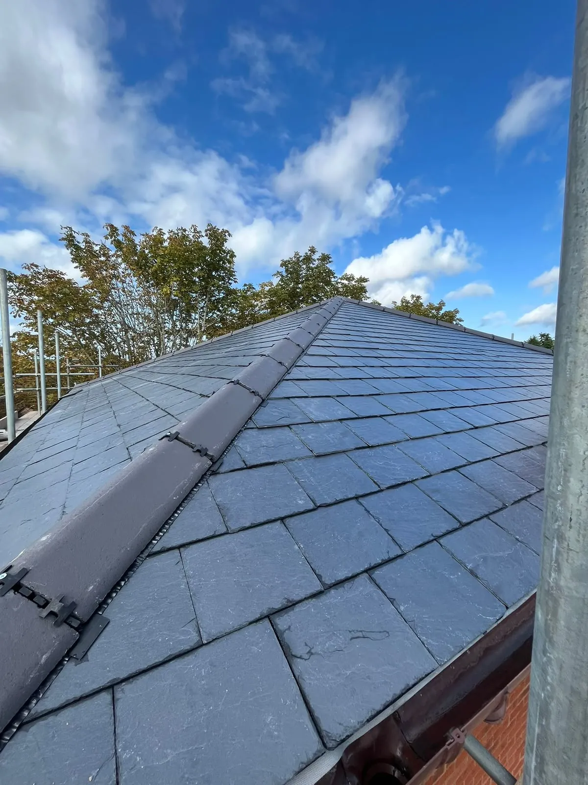 New slate roof with lead-lined ridge