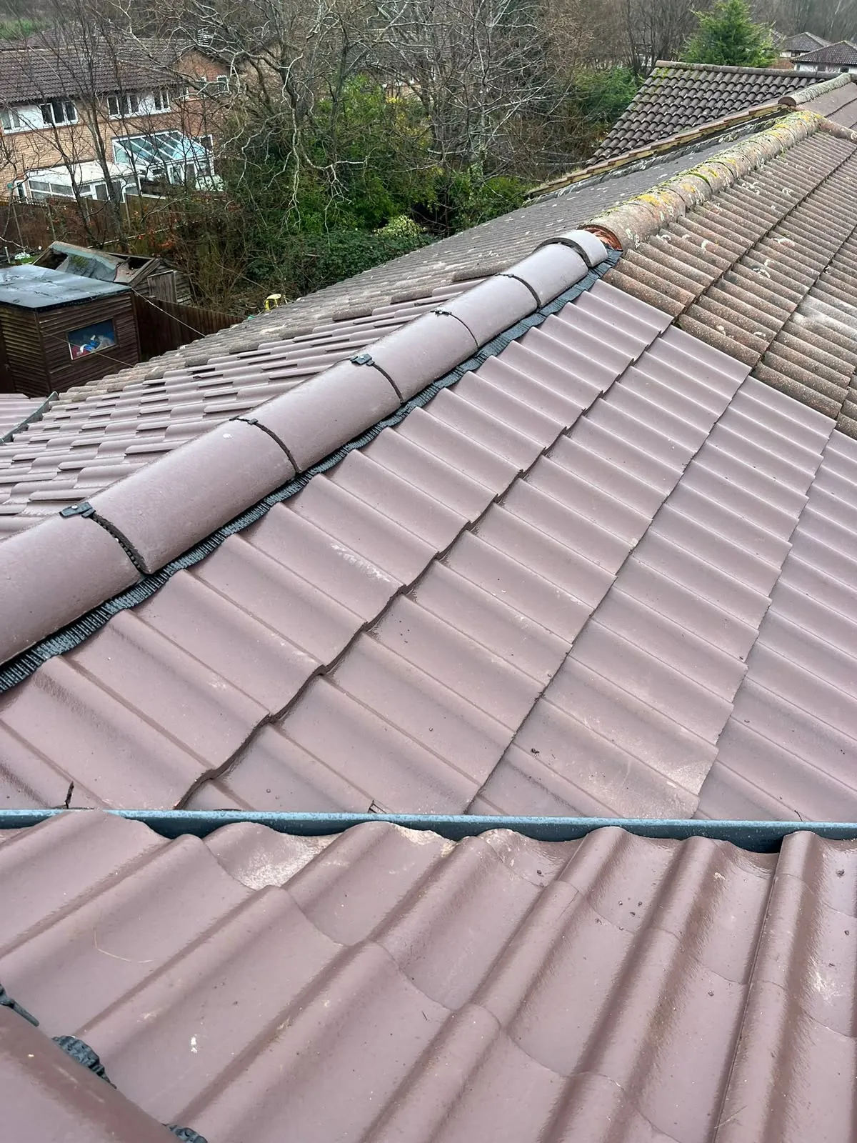 Interlocking tile re-roof