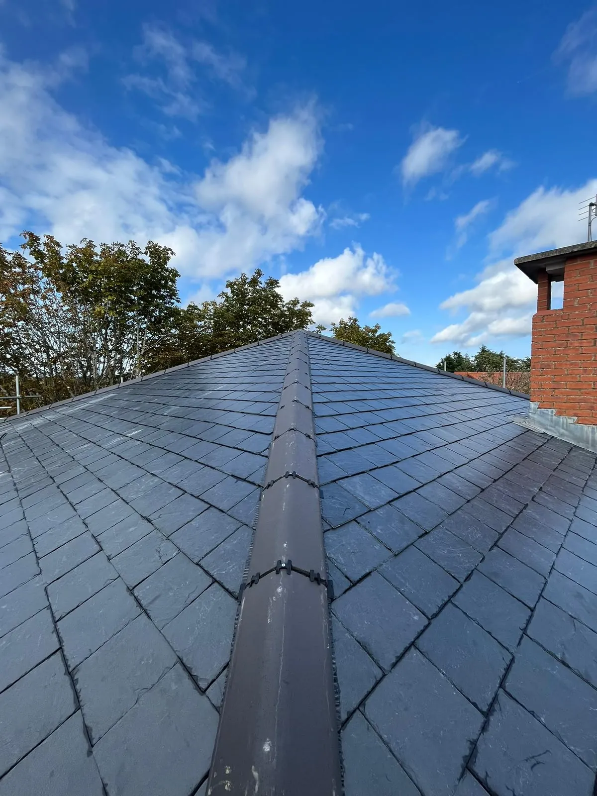 Slate re-roof, dry ridge